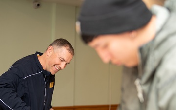 U.S. Navy Sailors Feed Local Community