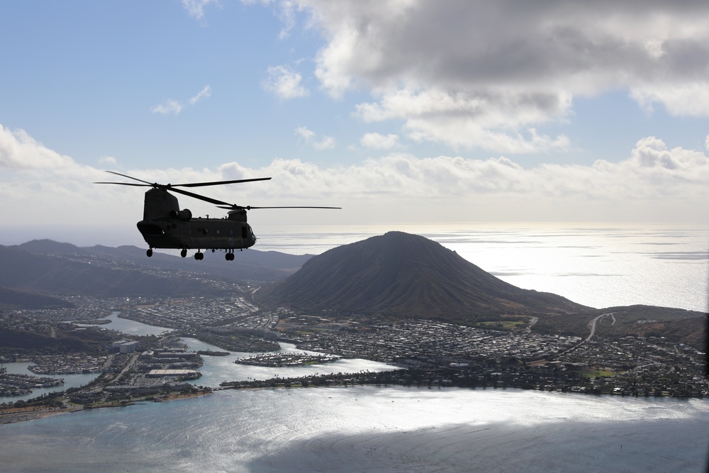 Hawaii Army National Guard CH-47 Chinook helicopter flies over O'ahu