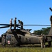 Soldiers perform end-of-flight maintenance on UH-60 Black Hawk helicopter