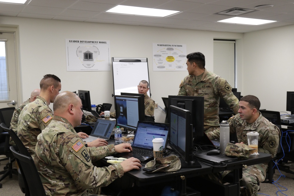 Washington National Guard Defensive Cyber Operations Element Collaborates Together to Defend the Network During Cyber Shield 2022.