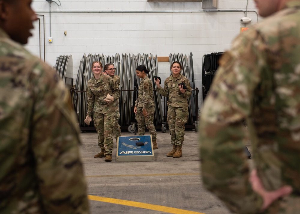 Rising 6, Top 3, and CGO Councils Give Back to 102nd IW Airmen