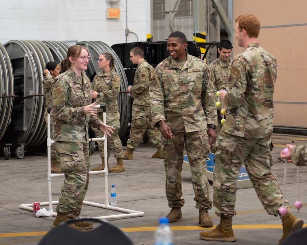 Rising 6, Top 3, and CGO Councils Give Back to 102nd IW Airmen