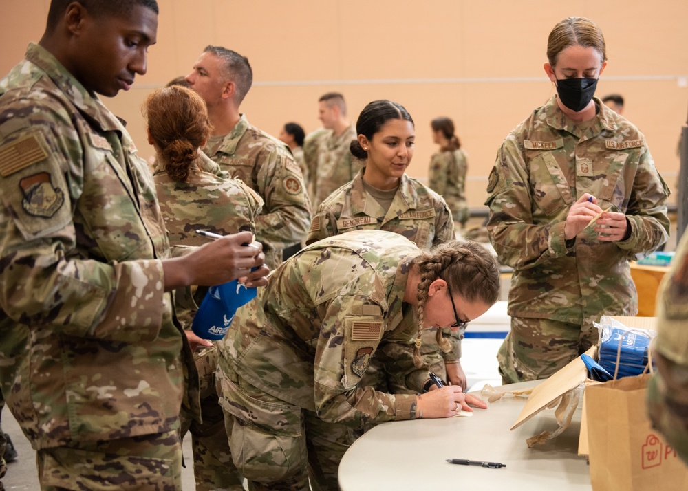 Rising 6, Top 3, and CGO Councils Give Back to 102nd IW Airmen