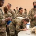 Rising 6, Top 3, and CGO Councils Give Back to 102nd IW Airmen