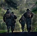 Marines are challenged during a squad competition, at Marine Corps Base Quantico, Va.
