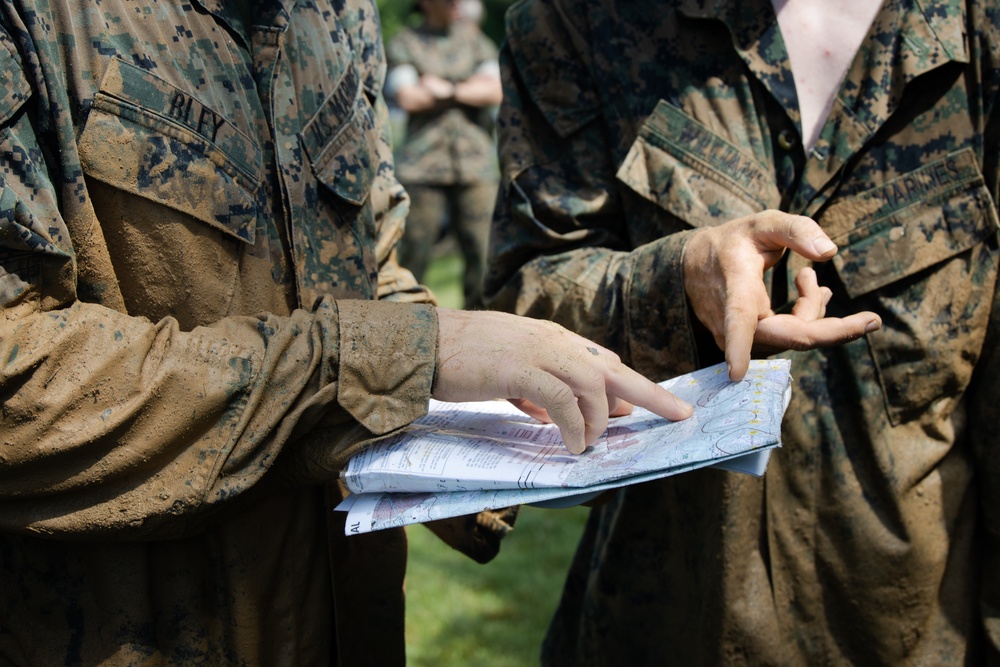 Marines are challenged during a squad competition, at Marine Corps Base Quantico, Va.