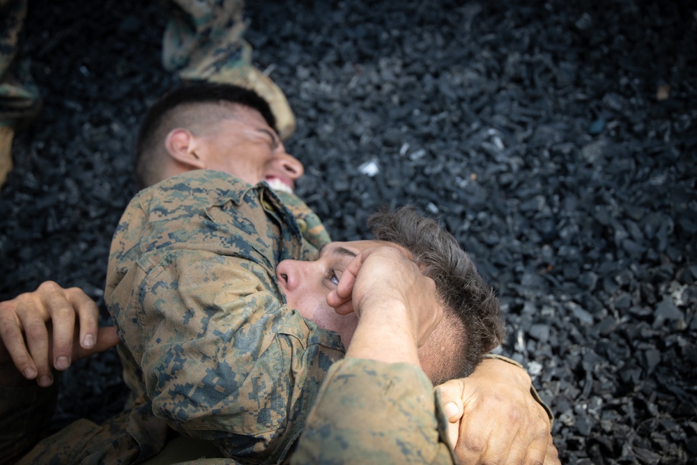 Marines are challenged during a squad competition, at Marine Corps Base Quantico, Va.