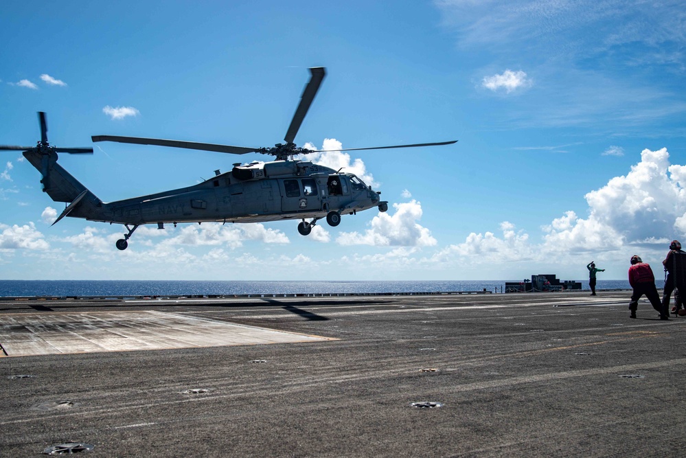 USS Ronald Reagan (CVN 76) hosts Rear Adm. Robert Clark and Brig. Gen. Akshai Gandhi during Valiant Shield 22