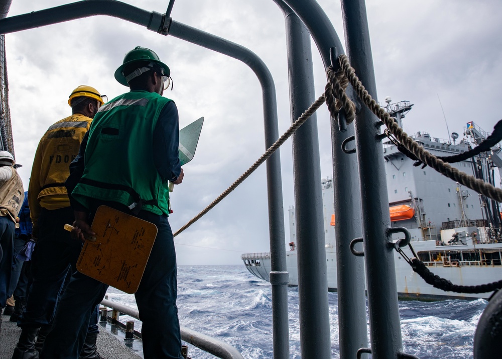 USS Leyte Gulf refueling at sea.