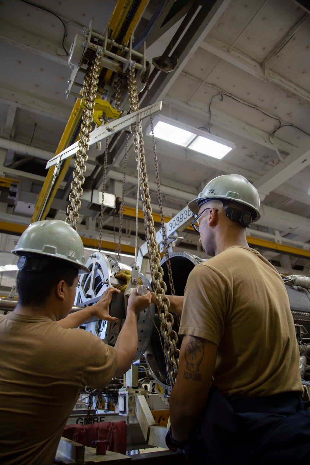 Abraham Lincoln Sailors conduct engine maintenance
