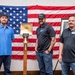 Tentative TRFB Hire Poses for Photo at Job Fair