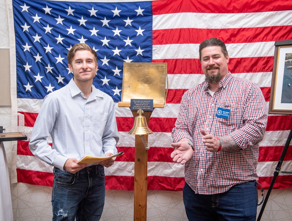 Tentative TRFB Hire Poses for Photo at Job Fair