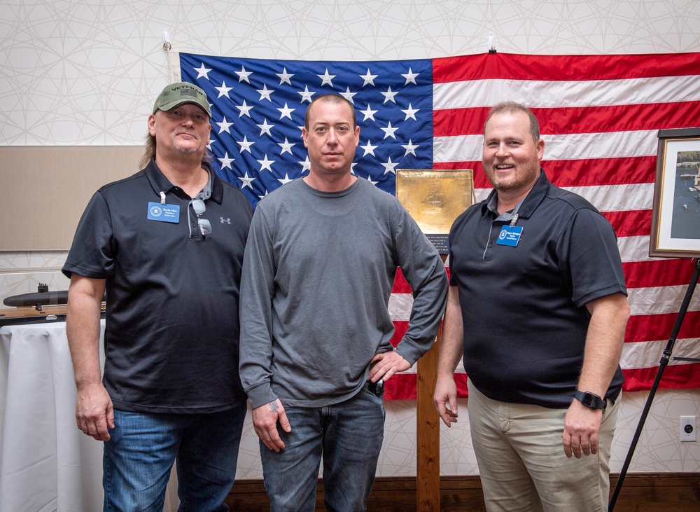 Tentative TRFB Hire Poses for Photo at Job Fair