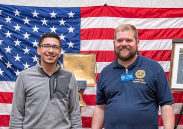 Tentative TRFB Hire Poses for Photo at Job Fair