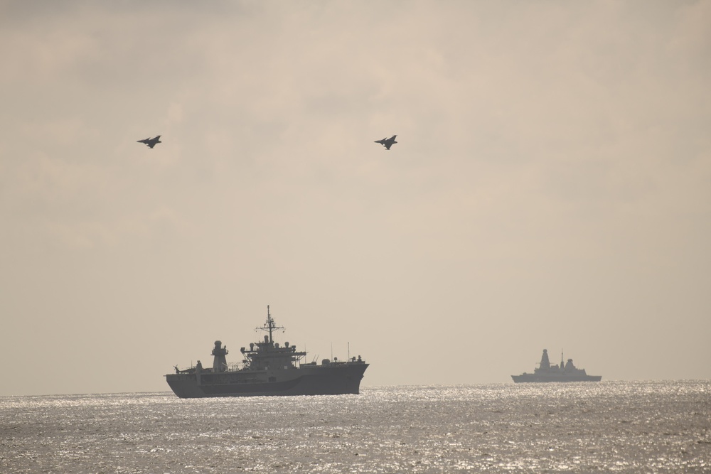USS Mount Whitney, HMS Defender, and Swedish JAS-39 Gripens operate together