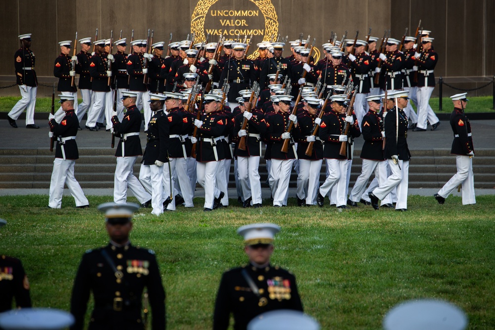 Marine Barracks Washington conducts their first evening parade at the Iwo Jima memorial.
