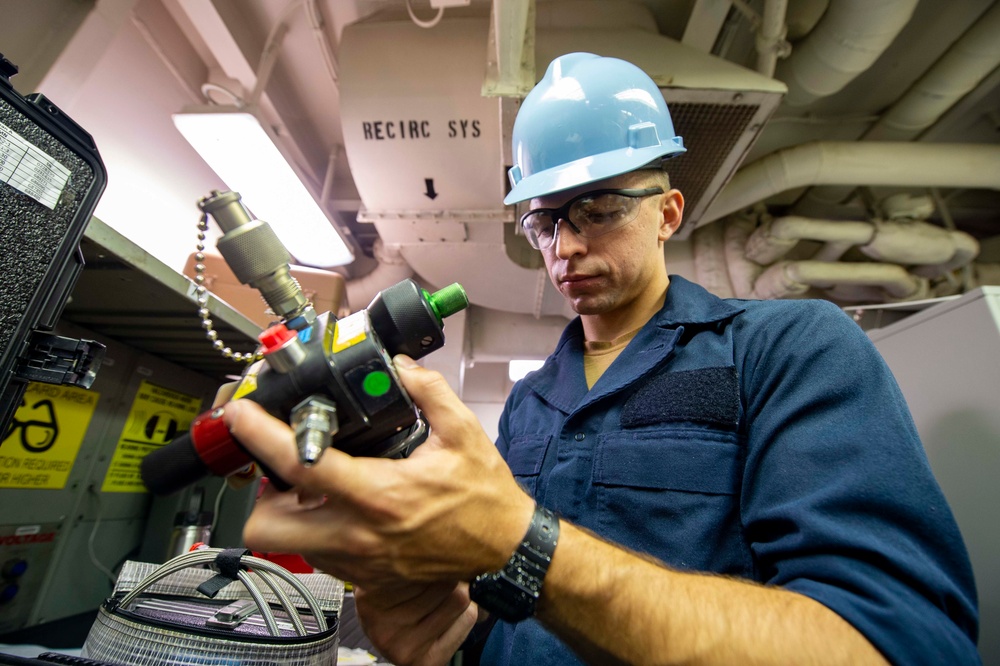 USS Carl Vinson (CVN 70 Sailors Work In-Port