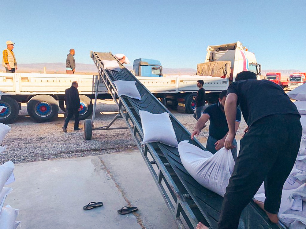 First vehicle of shipment being loaded before crossing to Northeastern Syria.