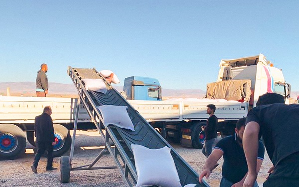 First vehicle of shipment being loaded before crossing to Northeastern Syria.