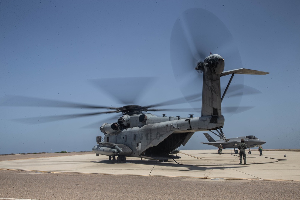 Marine Heavy Helicopter Squadron 466 and, 422nd Test Evaluation Squadron conduct Air Delivered Ground Refueling