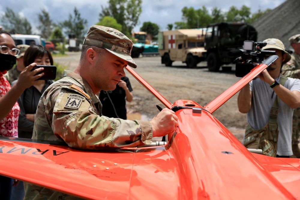 Lt. Col. Anthony Falcon Signs a Target Drone