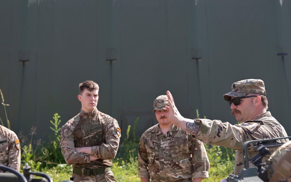 Washington Army National Guard soldiers conduct howitzer familiarization classes for foreign partners