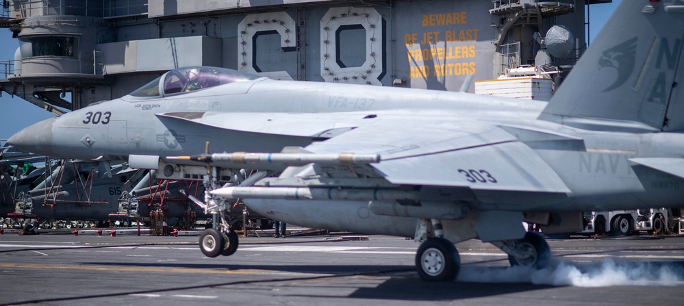 An F/A-18E Super Hornet Lands On The Flight Deck