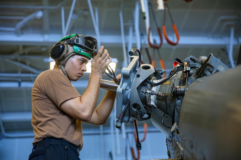 Abraham Lincoln Sailors conduct aircraft maintenance
