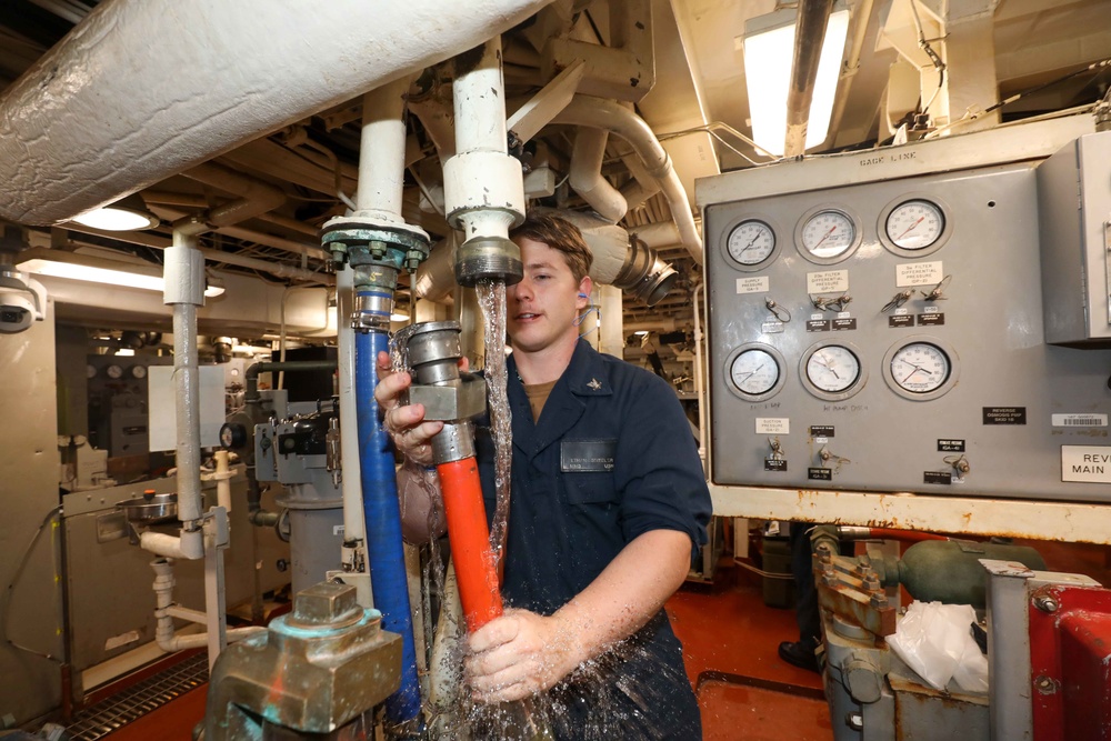 USS Cole Conducts a replenishment at sea with USNS Supply