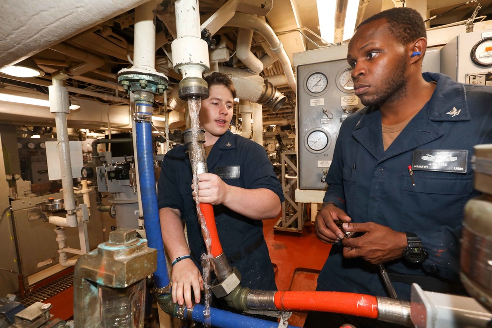 USS Cole Conducts a replenishment at sea with USNS Supply