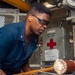 USS Ronald Reagan machine shop Sailors manufacture tools underway