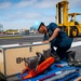 USS Carl Vinson (CVN 70) Sailors Pre-Stage Damage Control Equipment