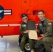 Coast Guard Aviation Training Center Mobile awards 7-year-old boy honorary aviator title