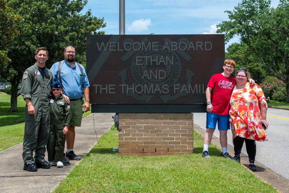 Coast Guard Aviation Training Center Mobile awards 7-year-old boy honorary aviator title