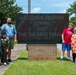 Coast Guard Aviation Training Center Mobile awards 7-year-old boy honorary aviator title