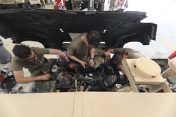 Mechanics from military police units turn wrenches