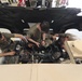 Mechanics from military police units turn wrenches