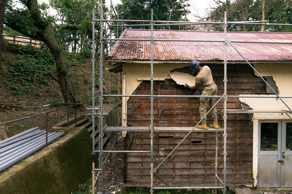 110th Wing Civil Engineers demo wall siding during Japan DFT