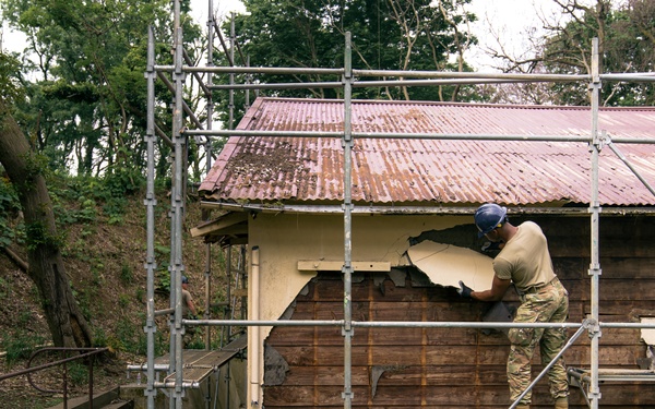 110th Wing Civil Engineers demo wall siding during Japan DFT