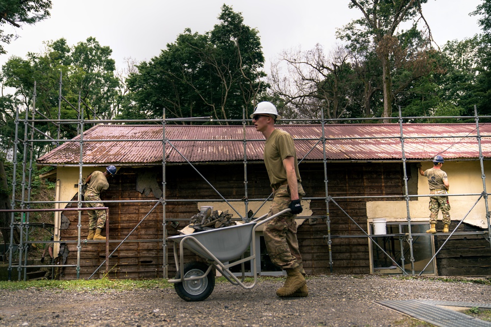 110th Wing Civil Engineers demo wall siding during Japan DFT