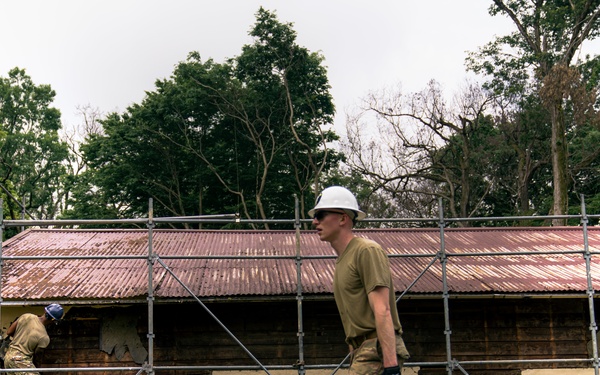110th Wing Civil Engineers demo wall siding during Japan DFT