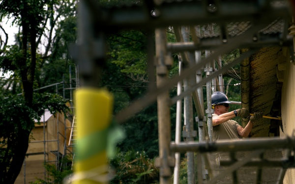 110th Wing Civil Engineers demo wall siding during Japan DFT