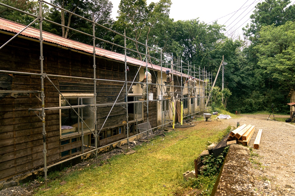 110th Wing Civil Engineers demo wall siding during Japan DFT