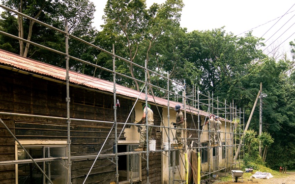 110th Wing Civil Engineers demo wall siding during Japan DFT