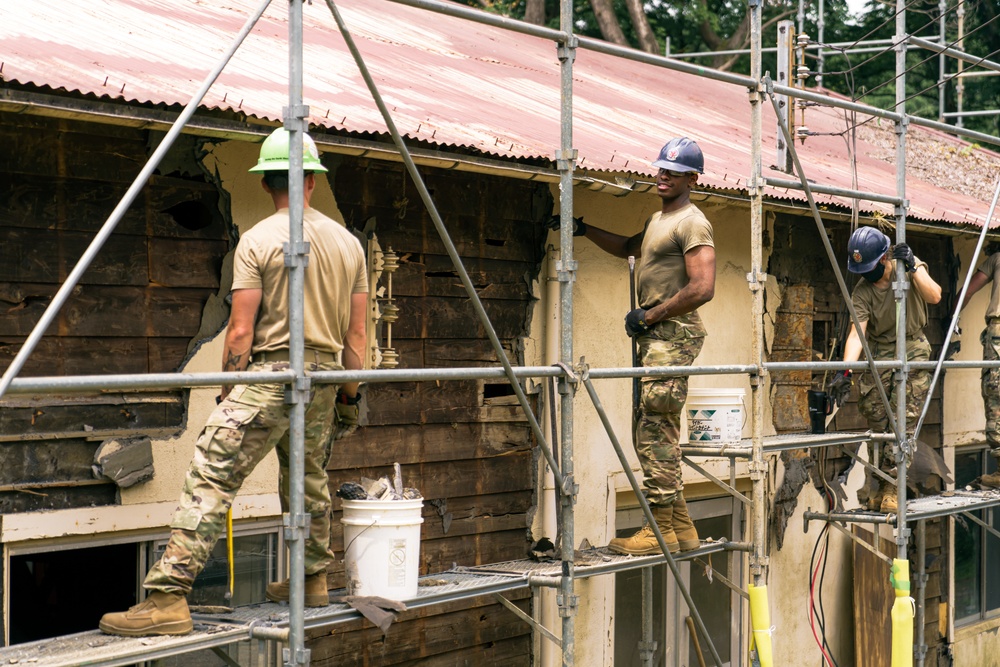 110th Wing Civil Engineers demo wall siding during Japan DFT
