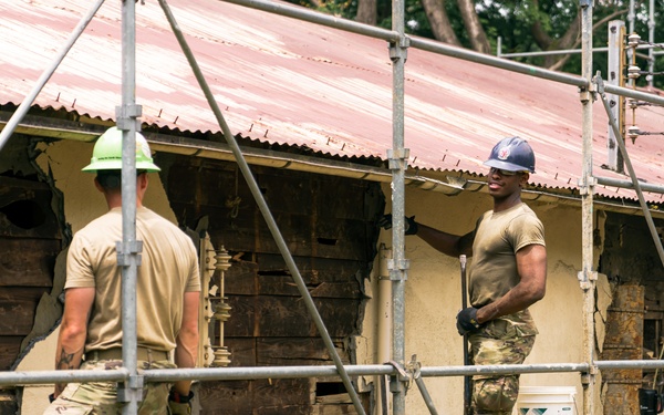 110th Wing Civil Engineers demo wall siding during Japan DFT