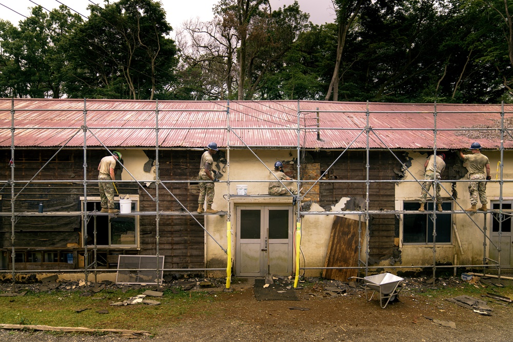 110th Wing Civil Engineers demo wall siding during Japan DFT