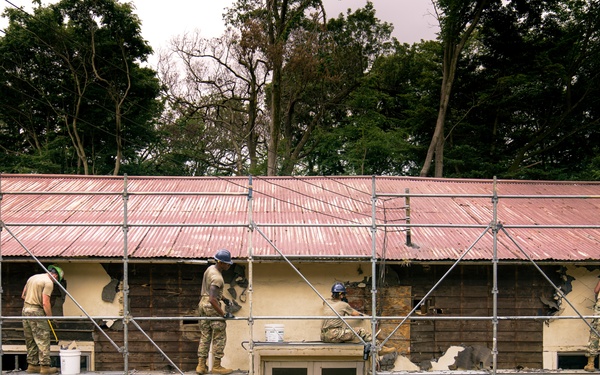 110th Wing Civil Engineers demo wall siding during Japan DFT