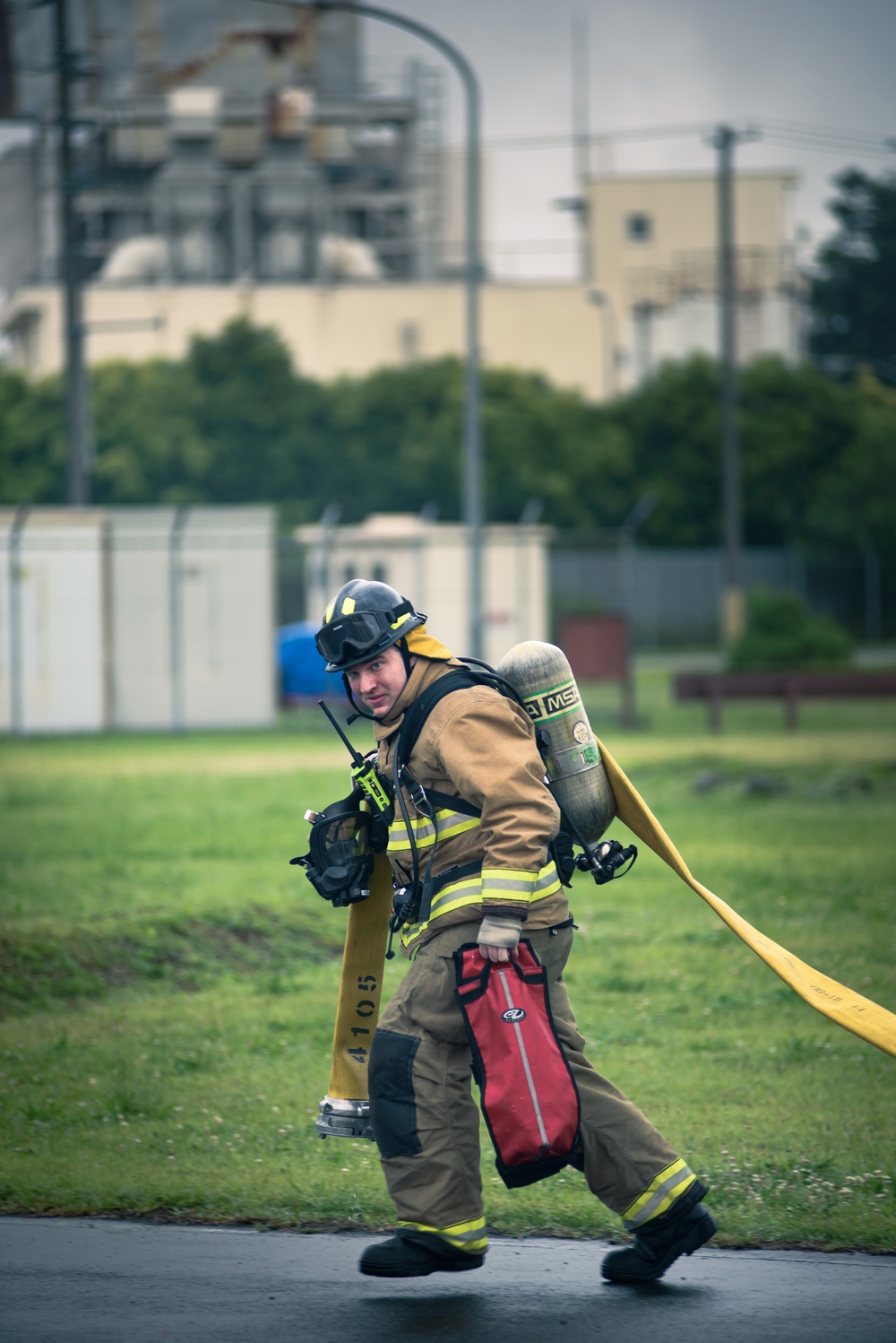 110th Wing Firefighters receive live building fire training during Japan DFT