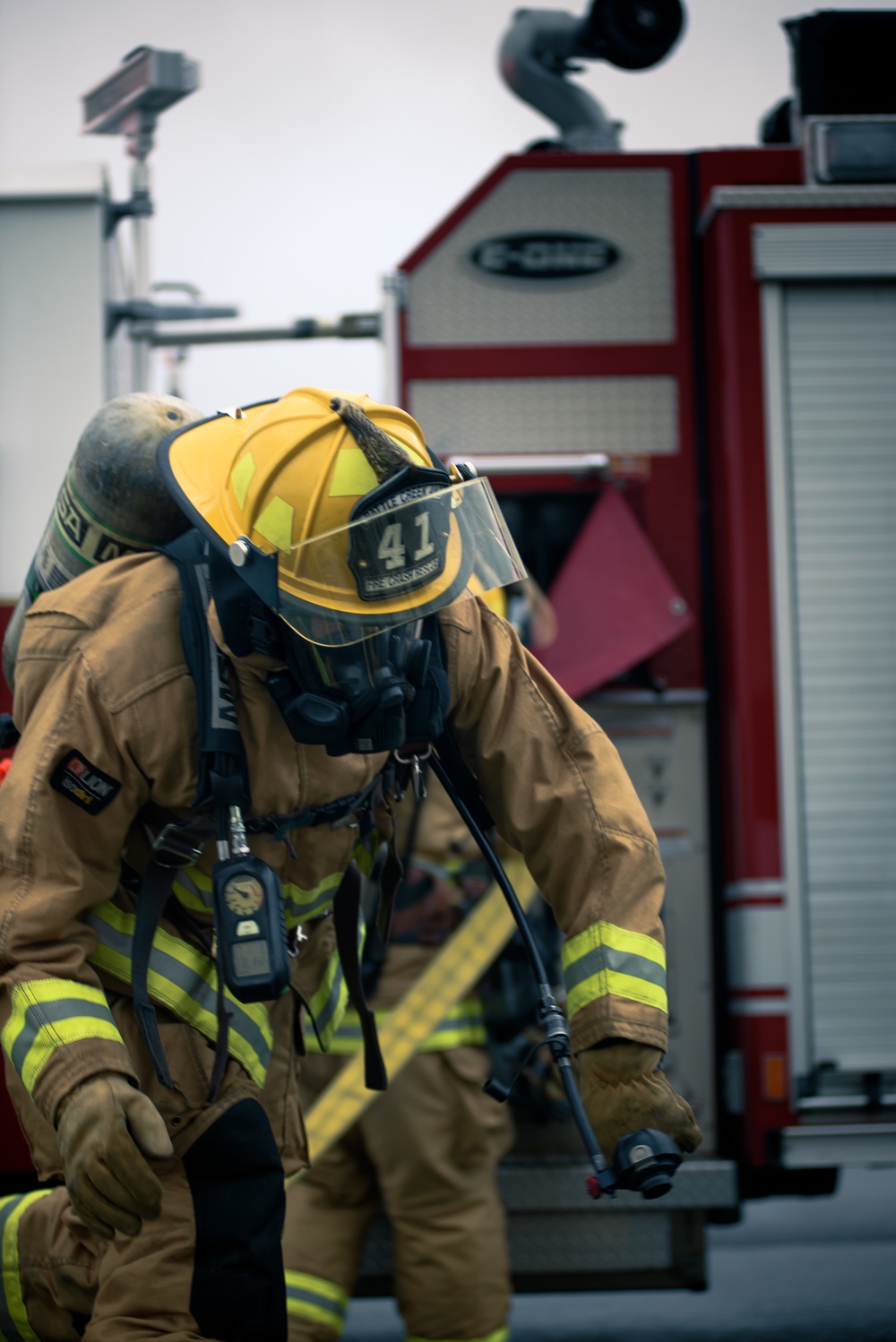 110th Wing Firefighters receive live building fire training during Japan DFT